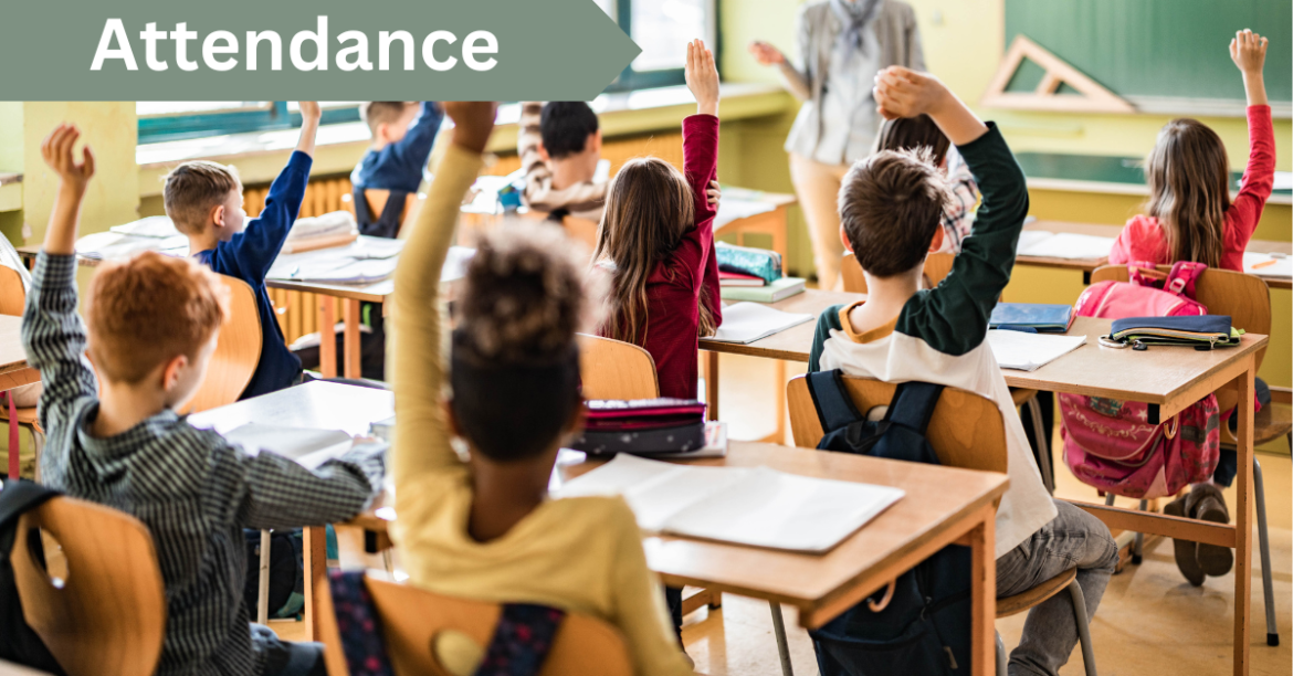 Students in a classroom raising hands.